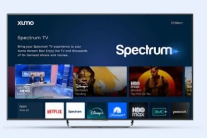 Spectrum TV interface showing streaming apps like Netflix, Disney+, HBO Max, and AMC+ on screen.